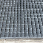1:12 scale Spanish roof tile foam board in dark gray with embossed rows of curved tiles, close-up of the texture