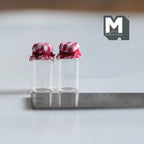 1:12 scale miniature glass jars with red checked fabric lids, set of 2, clear and empty, shown beside a ruler