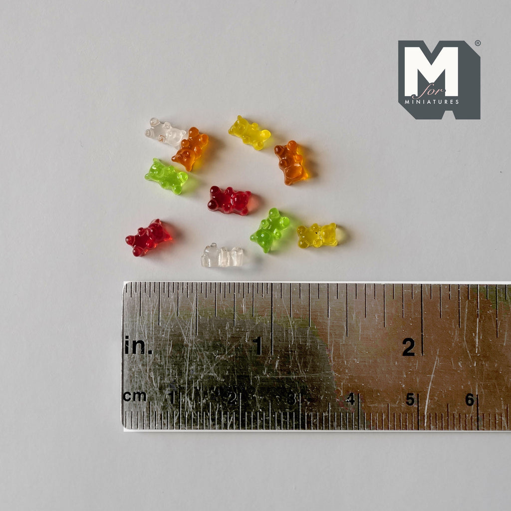 1:12 scale miniature assorted gummy bear candies, set of 10 in red, green, yellow, orange and clear, shown with a ruler