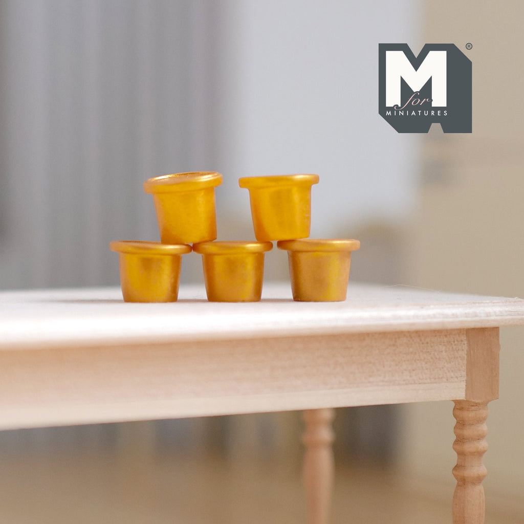 1:12 scale miniature gold ice cream cups with lids, set of 5, shown stacked on a wood table