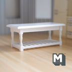 1:12 scale miniature white wood kitchen prep table with slatted lower shelf and turned legs, shown on a wood floor