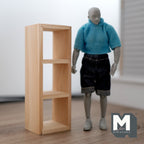 1:12 scale miniature unpainted wood cube shelf unit, 3 x 1, beige, tall open shelves shown beside a poseable figure