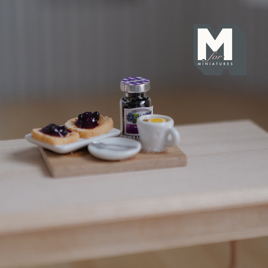 1:12 scale miniature breakfast board with jam toast, jam jar and lemon tea on a wood board, shown on a wood table