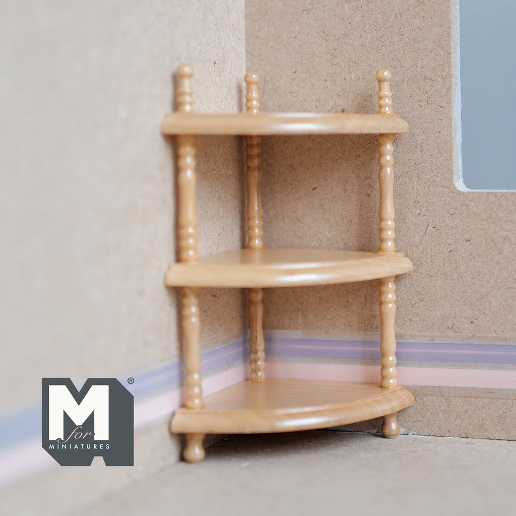1:12 scale miniature wood corner shelf unit in brown with 3 tiers and turned posts, shown in a room corner