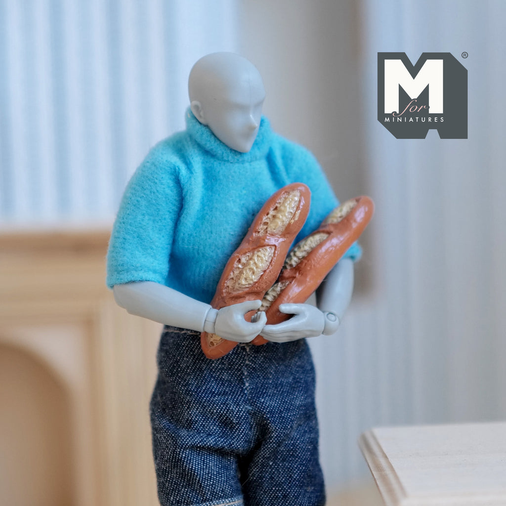 1:12 scale miniature French baguettes, set of 2, golden brown scored loaves, non-edible, held by a jointed figure