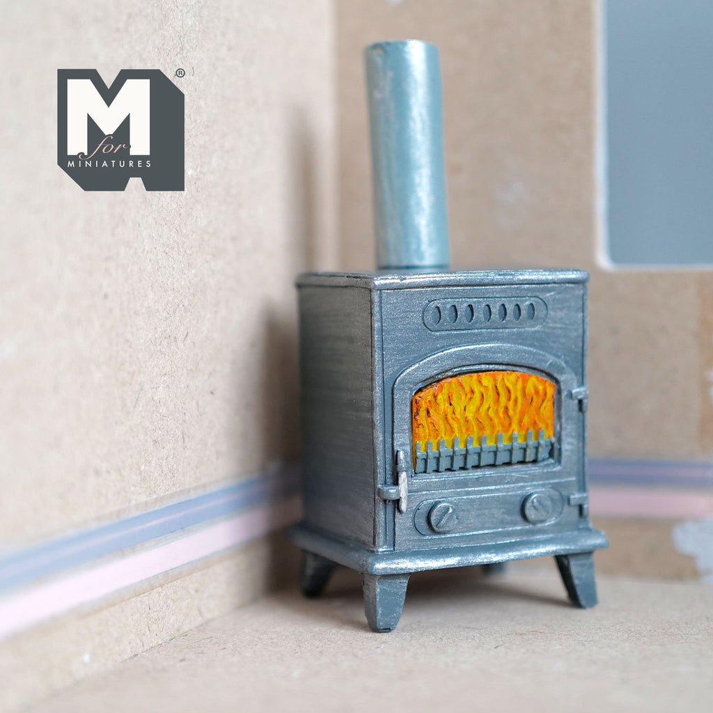 1:12 scale miniature cast resin retro wood burning stove with chimney, gray blue with an orange fire window