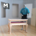 1:12 scale miniature unpainted wood jewelry display table with clear cover and cabriole legs, shown beside a figure