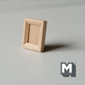 1:12 scale miniature small wood photo frame kit with stand in bare wood, portrait frame shown standing upright