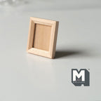 1:12 scale miniature medium wood photo frame kit with stand in bare wood, portrait frame shown standing upright