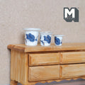 1:12 scale miniature ceramic flower pots with blue floral pattern on white, set of 3 graduated sizes, on a wood dresser