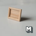 1:12 scale miniature large wood photo frame kit with stand in bare wood, landscape frame shown standing upright