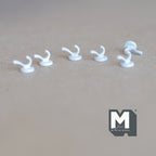1:12 scale miniature wall hooks in white, set of 6, single curved hooks with round bases, shown on a tan surface
