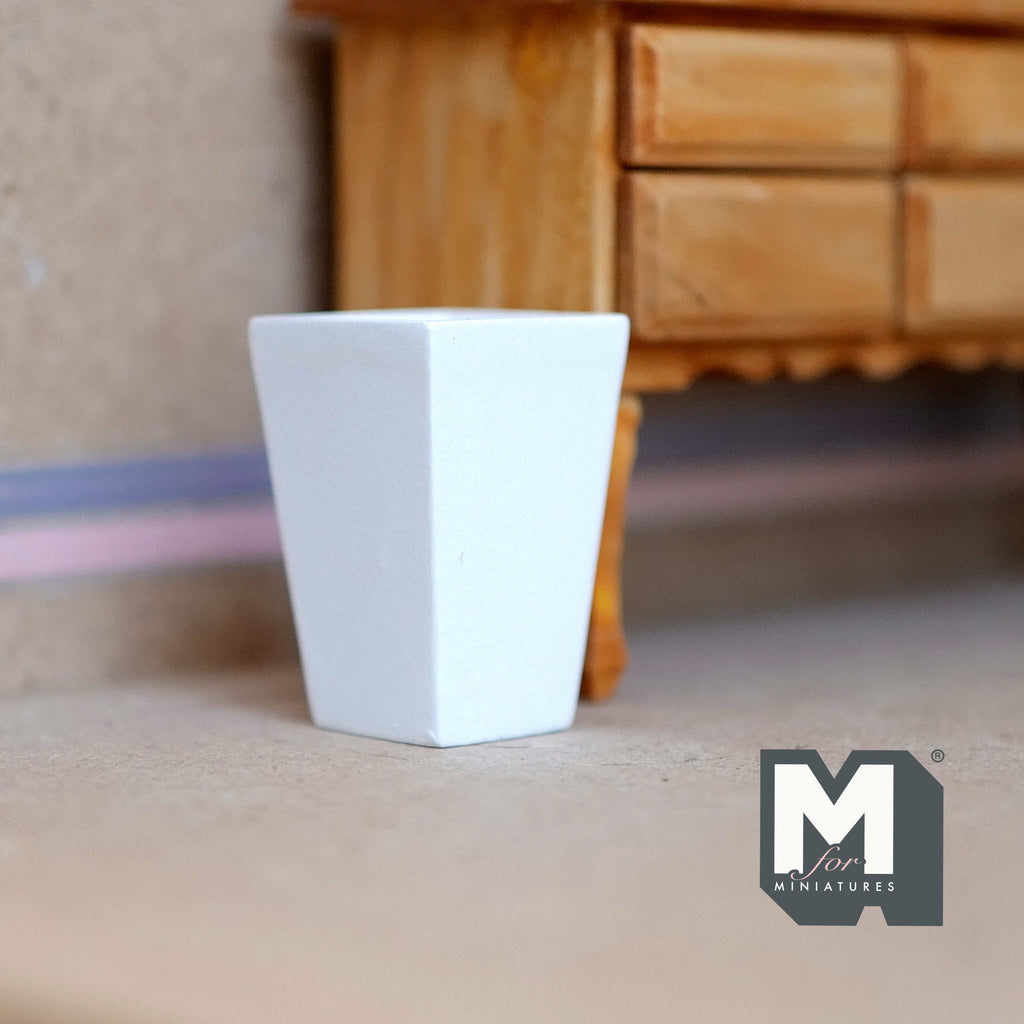 1:12 scale miniature cast resin tall square floor vase in white with tapered sides, shown on a wood floor