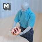 1:12 scale miniature lattice top berry pie on metal plate, red filling with golden crust, held by a jointed figure