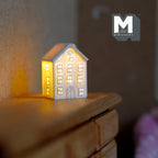 1:12 scale miniature white house lantern with micro LED lights and arched back doorway, glowing on a wood dresser