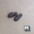 1:12 scale miniature woven strap sandals in dark brown, one pair, shown on a gray felt surface