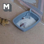 1:12 scale miniature cat litter box with scoop, litter and poop, set of 4, gray blue tray shown beside a toy cat