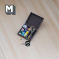 1:12 scale miniature dark brown wood needlework box with ribbons, thread and scissors, shown open on a light wood floor