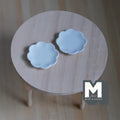 1:12 scale miniature ceramic scalloped plates with blue edged rim, set of 2, pale blue, shown on a round wood table