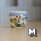 1:12 scale miniature large ceramic planter pot with colorful phoenix and floral design on white, on a wood table