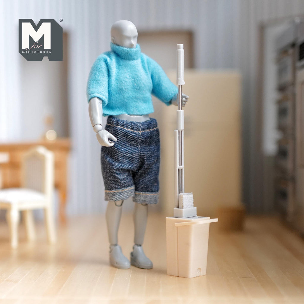 1:12 scale miniature flat floor mop and bucket in light beige gray, set of 2, shown with an artist figure