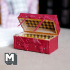 1:12 scale miniature faux leather picnic box in red with opening lid, straps and plaid lined fitted compartments