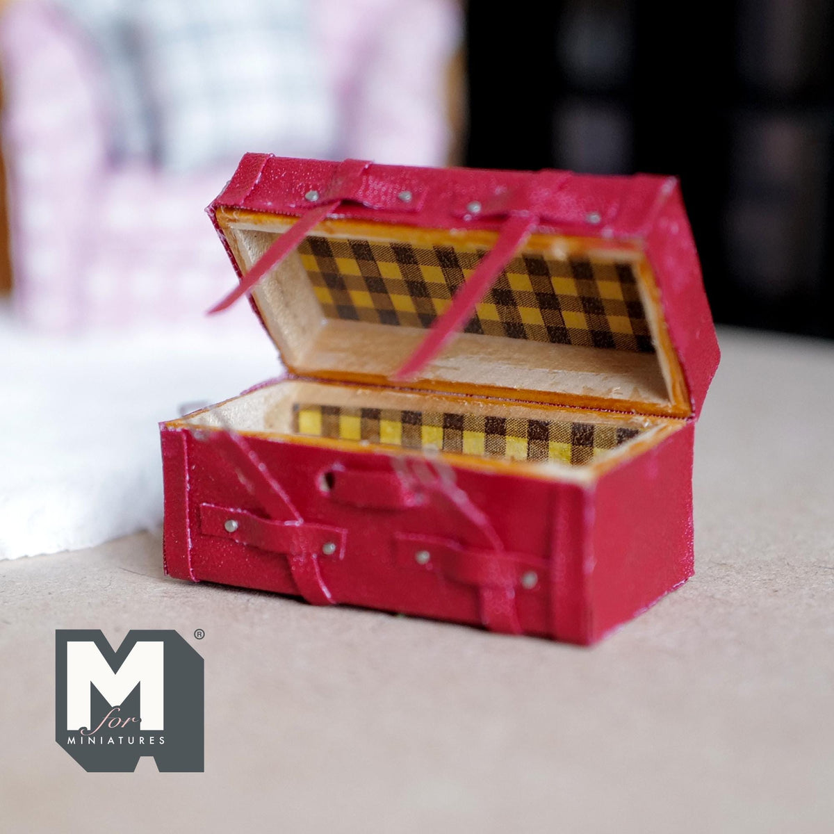 1:12 scale miniature faux leather picnic box in red with opening lid, straps and plaid lined fitted compartments