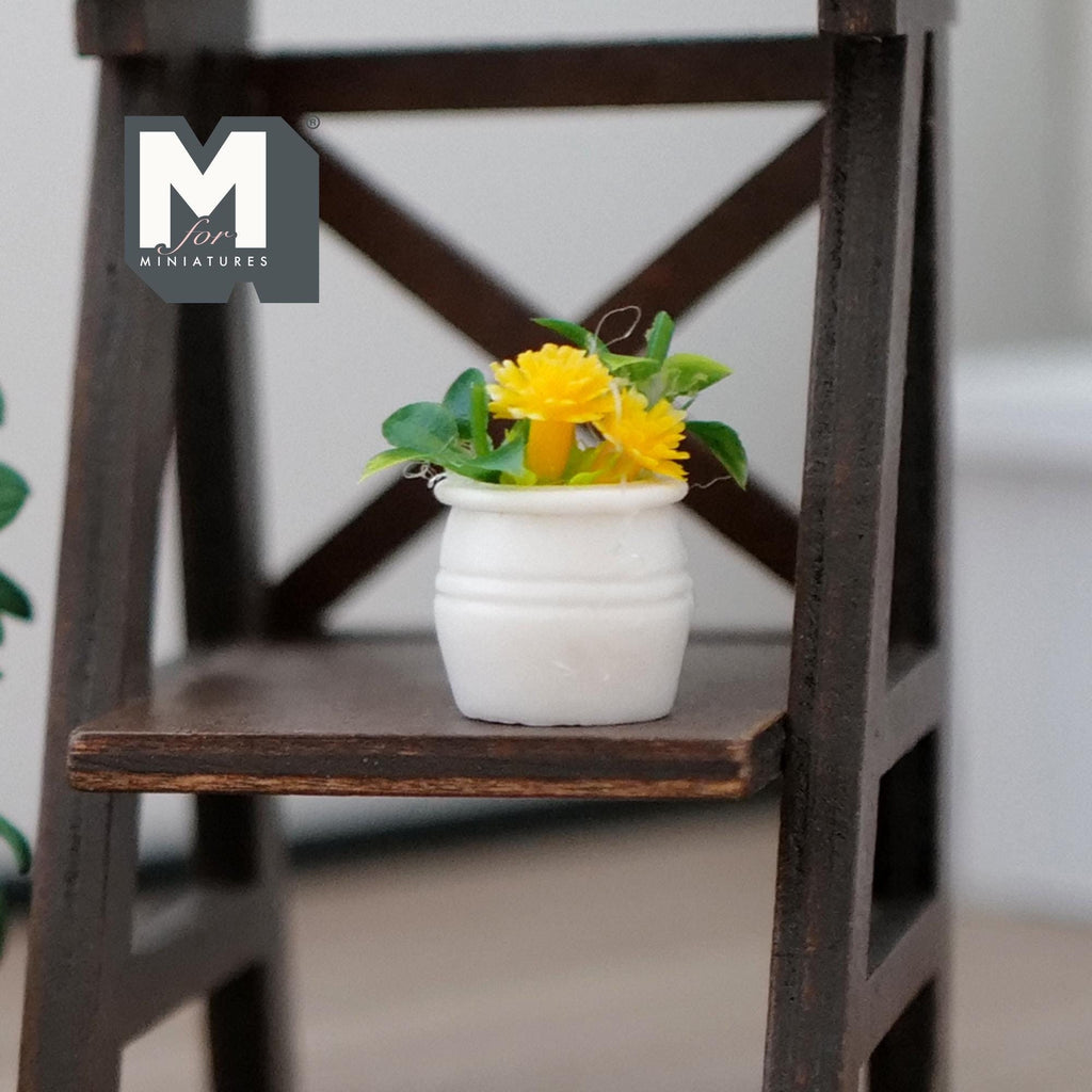 1:12 scale miniature potted flowering plant with yellow blooms in a white round pot, shown on a dark wood stand