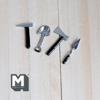 1:12 scale miniature metal garden tools, set of 4 with hammer, shovel, axe and trowel, black handles, shown on wood