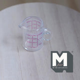 Miniature Measuring Cup with Measurements 1:12 Scale Dollhouse Supplies Glass Portion Cup with Handle 13/16 inch tall (glass) - A097