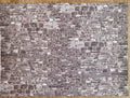 Miniature gray embossed stone wall sheet, irregular rubble stone pattern in mixed gray tones, full sheet shown flat