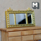 1:12 scale miniature ornate triple panel mantel mirror in gold with crest tops, shown on a wood dresser