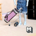 1:12 scale miniature golf bag on pull cart with 2 clubs, pink gingham faux leather, shown with a jointed figure