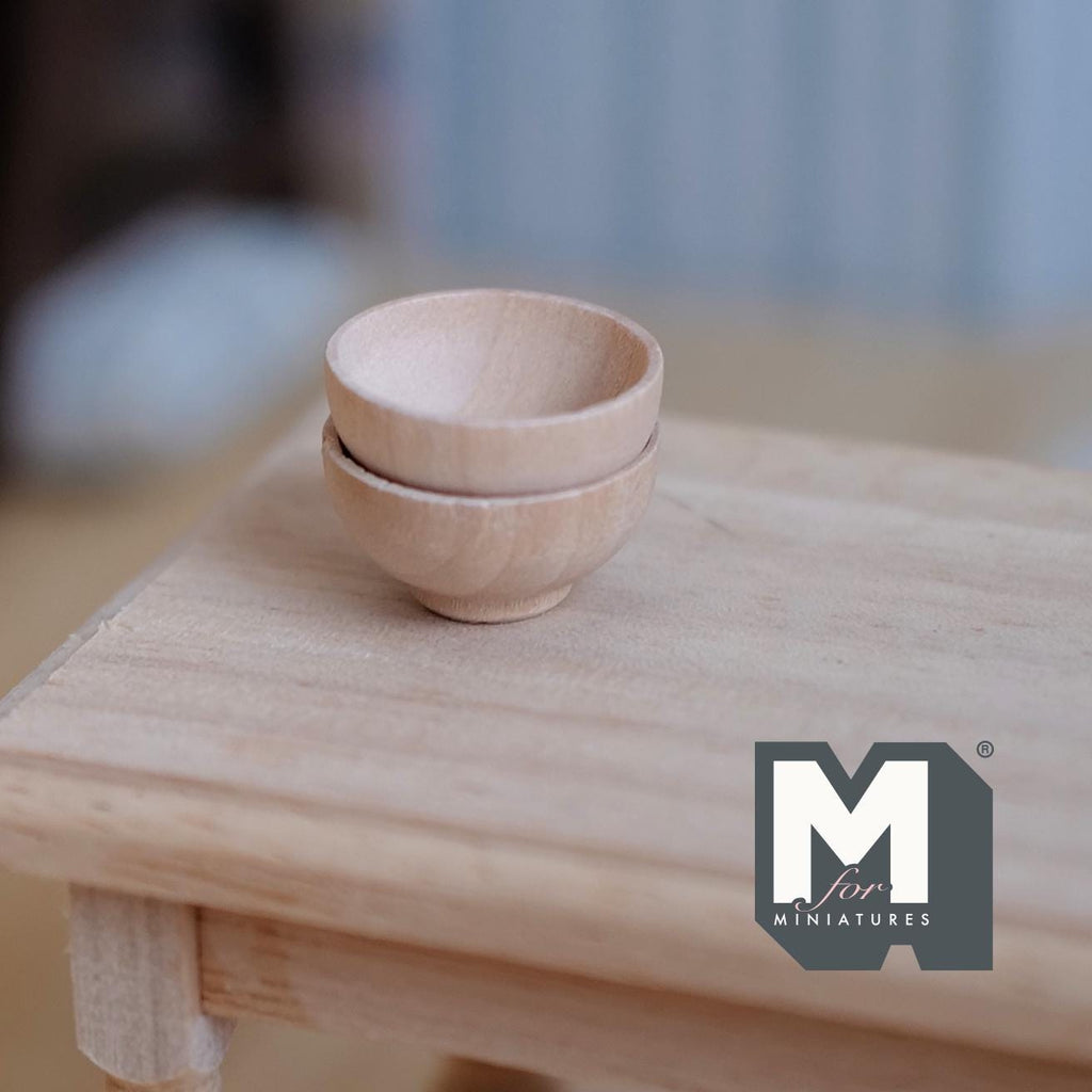 1:12 scale miniature wood bowls in natural finish, set of 2, shown stacked on a light wood table