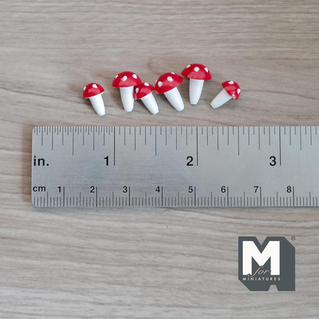 1:12 scale miniature toadstools with red caps and white spots, single stem, set of 6, shown with a ruler