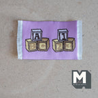 1:12 scale miniature lavender letter blocks rug with ABC and 123 toy block design and white fringe