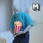 1:12 scale miniature resin popcorn bucket with popcorn, large size, red striped tub held by a jointed figure