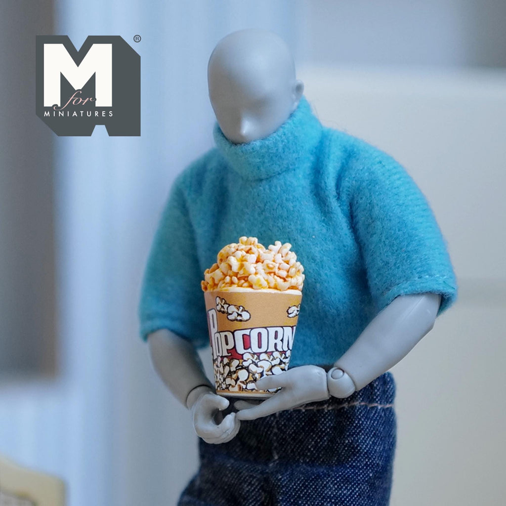 1:12 scale miniature resin popcorn bucket with popcorn, large size, yellow striped tub held by a jointed figure