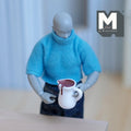 1:12 scale miniature resin pitcher with chocolate sauce, white jug with brown sauce, held by a jointed figure