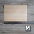 Miniature hinoki cypress peel and stick wood veneer sheet for floors, walls and crafts, pale cream grain, shown with a ruler
