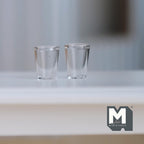 1:12 scale miniature real glass tumblers in clear, set of 2, shown on a white shelf