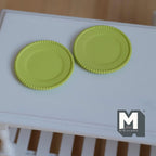 1:12 scale miniature dinner plates with ribbed rim in lime green, set of 2, shown on a white table