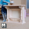 1:12 scale miniature wood fireplace with turned columns in bare wood, low front rail, shown beside a jointed figure