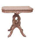 1:12 scale miniature Victorian pedestal table kit in beige with a carved scroll base, shown assembled on white