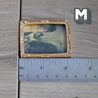 1:12 scale miniature vintage wedding portrait in a gold frame, sepia toned picture, shown with a ruler