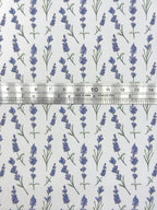 1:12 scale miniature lavender sprig peel and stick wallpaper, purple flowers with green stems on white, shown with a ruler