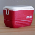 1:12 scale miniature camping cooler with lid, large, red body with white lid and side handles, on a wood surface