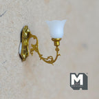 1:12 scale miniature Victorian tulip shade wall sconce in gold, non working, white frosted shade on a scrolled arm