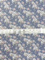 1:12 scale miniature blue floral vine peel and stick wallpaper, white and pink blooms on dusty blue, shown with a ruler