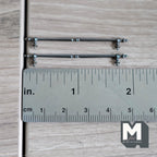 1:12 scale miniature long French door pull handles in metallic gray, set of 2, slim bars shown with a ruler